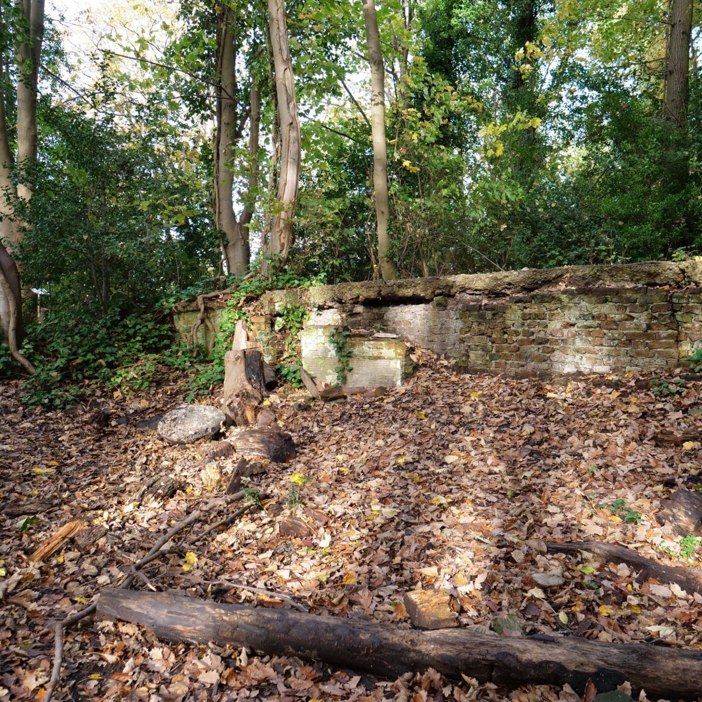 Looking up at 2nd and 3rd floor of brick terrace with corner turret bearing carved inscriptions St Aubyn's Parade